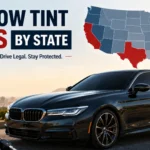 Modern black car with dark tinted windows for window tint laws by state article