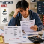 Young adult reviewing bills and finances while learning about common money mistakes to avoid.